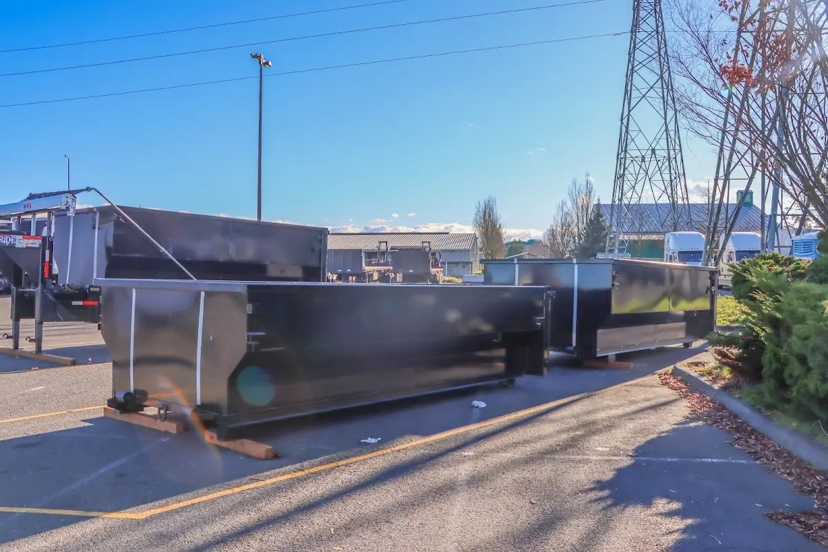 Roll-off dumpster ready for waste disposal at job site for Demolition Dumpster Rental in Canandaigua